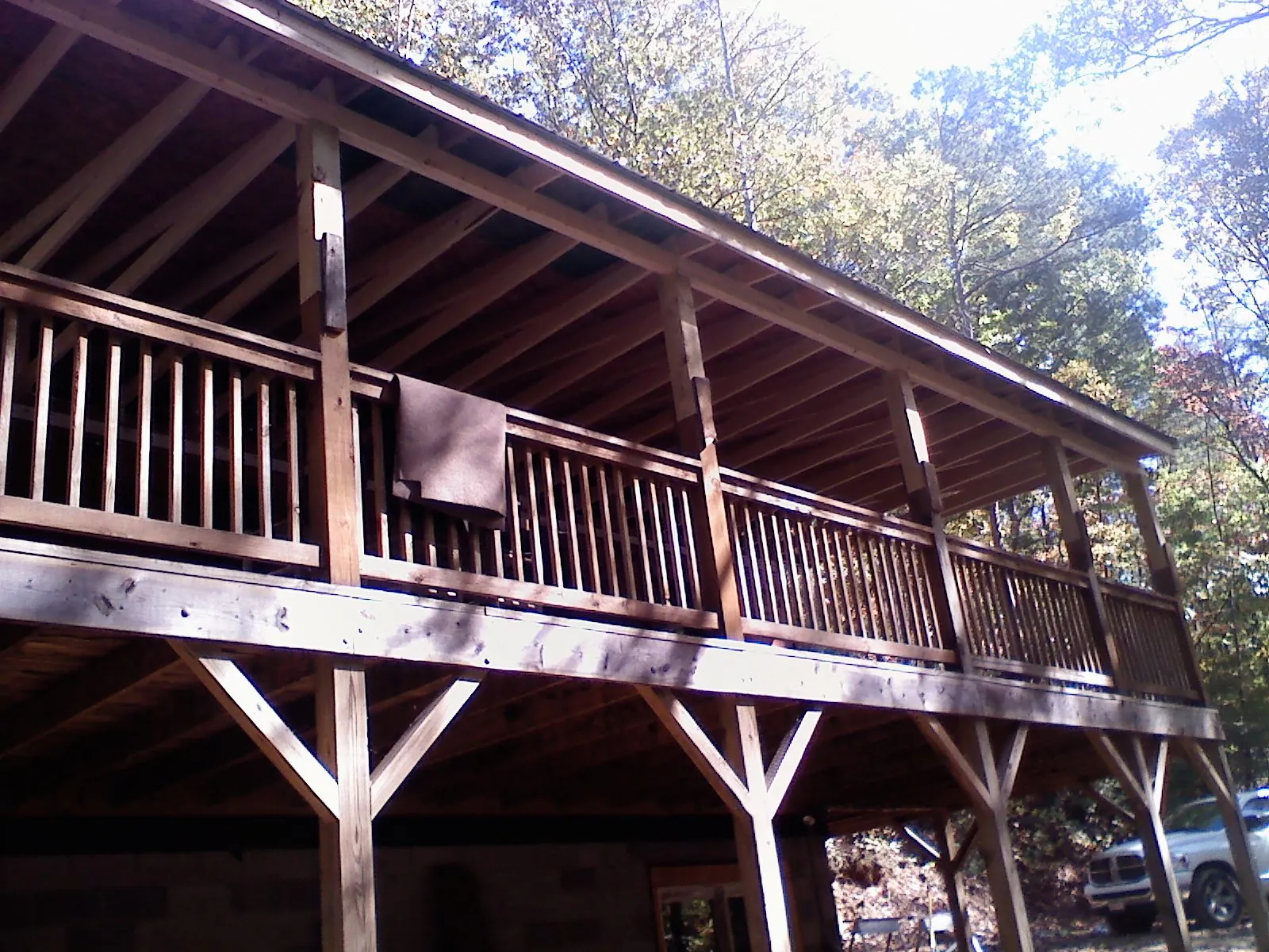 Timber framing under a new elevated porch and deck — Roof Leak Repair in Lynnfield by Roofing Brothers